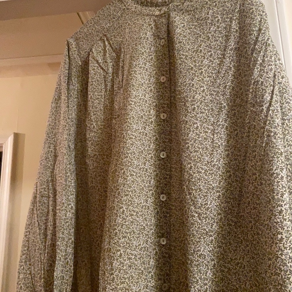 Laude the Label top